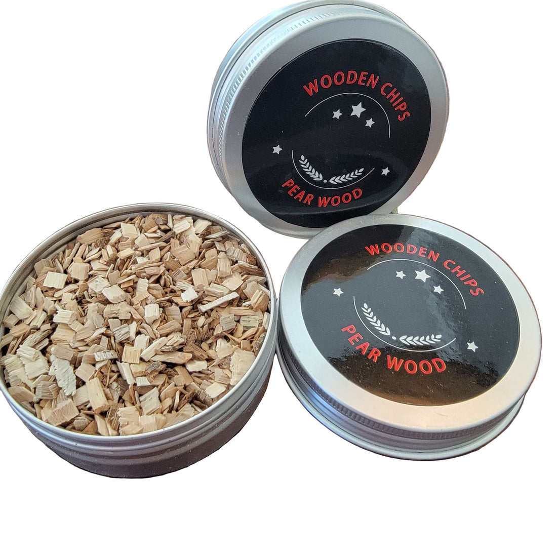 A metal tin containing replacement wood chips for cocktail smoking, with various wood types displayed such as pear, pecan, cherry, and apple.