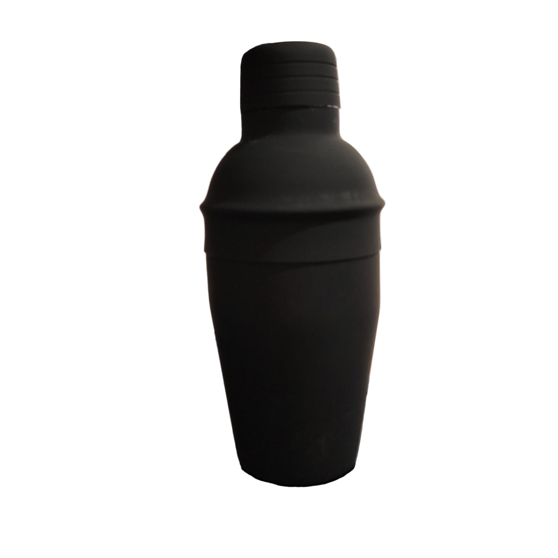A black powder coated cobbler shaker standing upright on a surface with natural lighting.